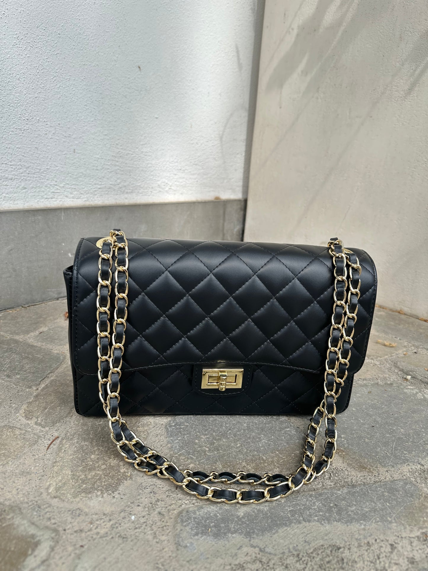 TRACOLLINA IN PELLE NERA