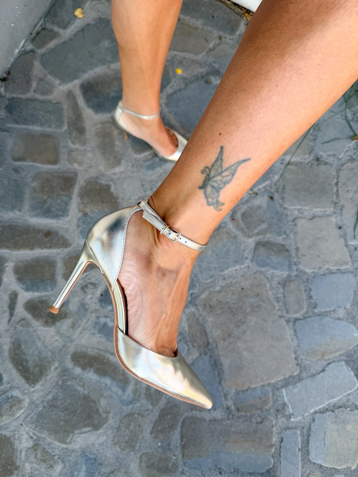 DECOLLETE' IN PELLE ORO