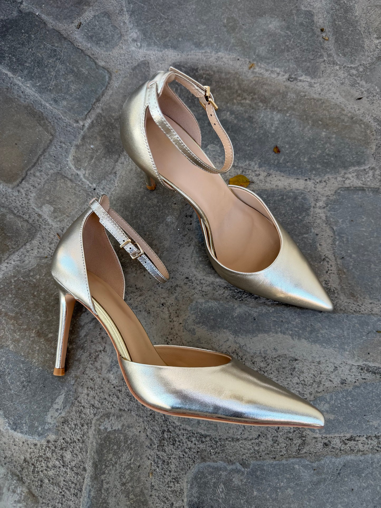 DECOLLETE' IN PELLE ORO